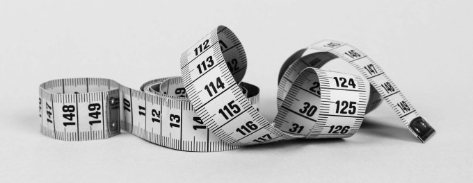 Image of a tape measure as a metaphor for the ideal podcast length