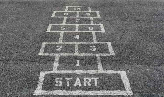 Numbers 1-10 spraypainted on asphalt depict the strategies that will help you understand how to promote a podcast